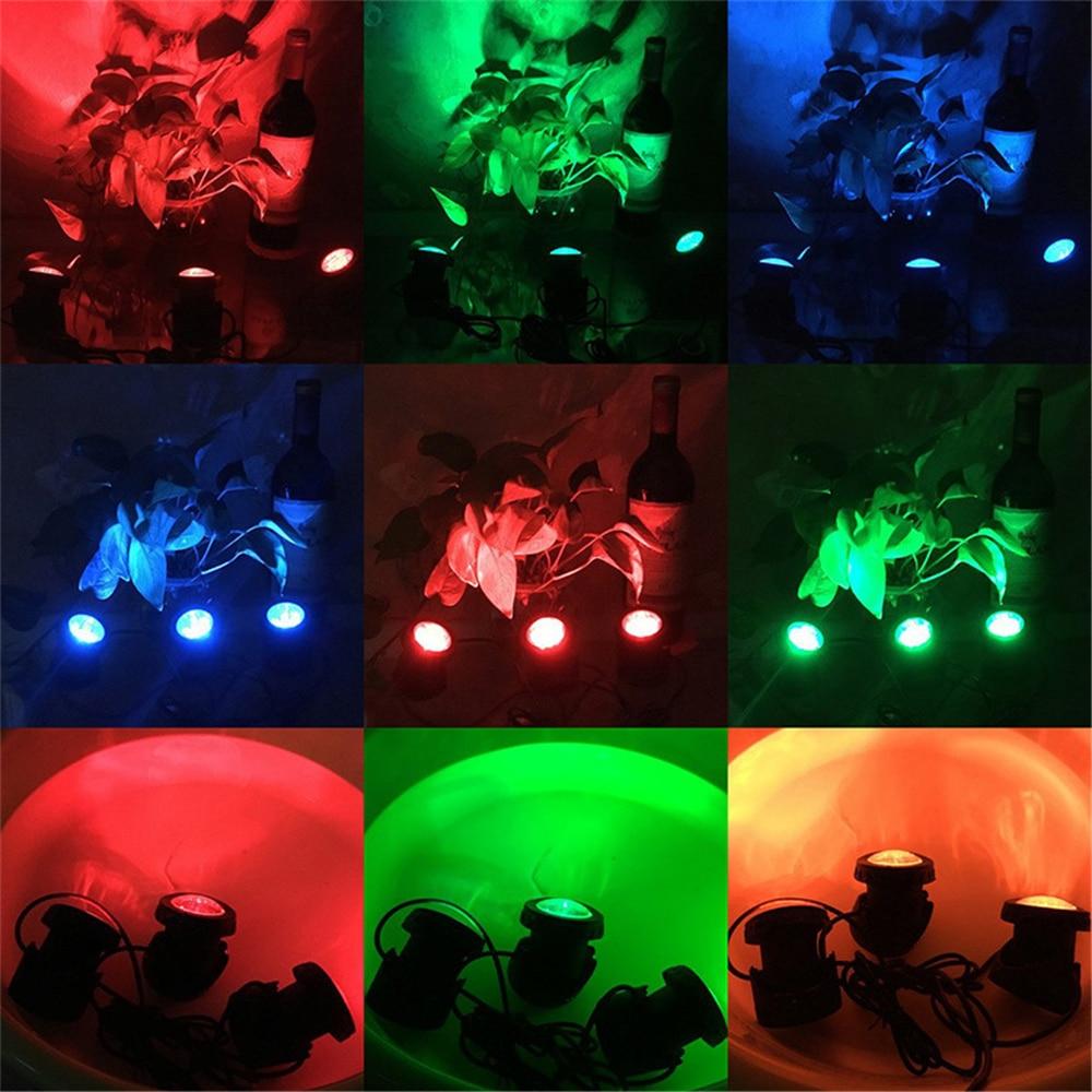 Runa multicolour solar lawn lights demonstrating red, green and blue garden illumination