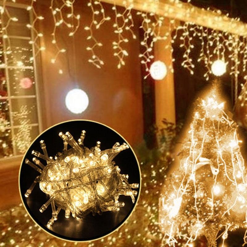 Ylva warm white LED curtain lights with a coiled strand detail and festive display