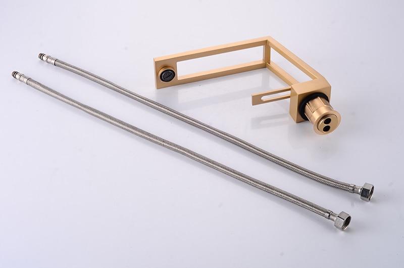 Gold cut-out basin tap with two braided supply hoses