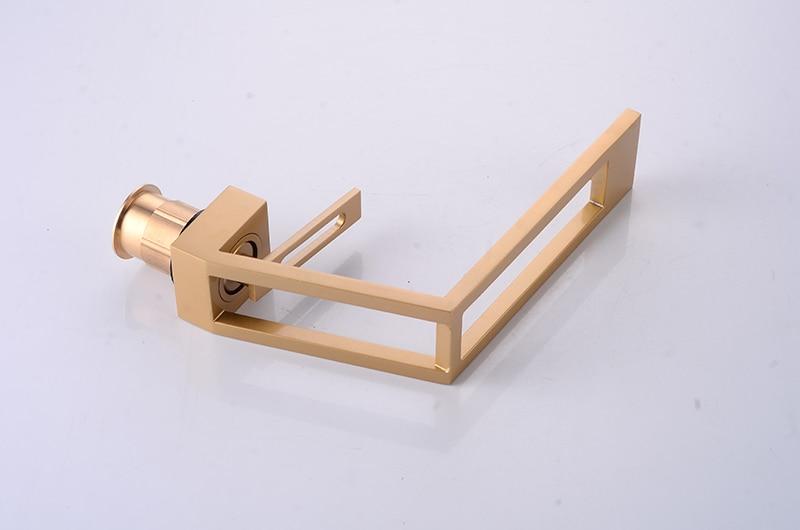 Gold cut-out basin tap underside and threaded brass connection