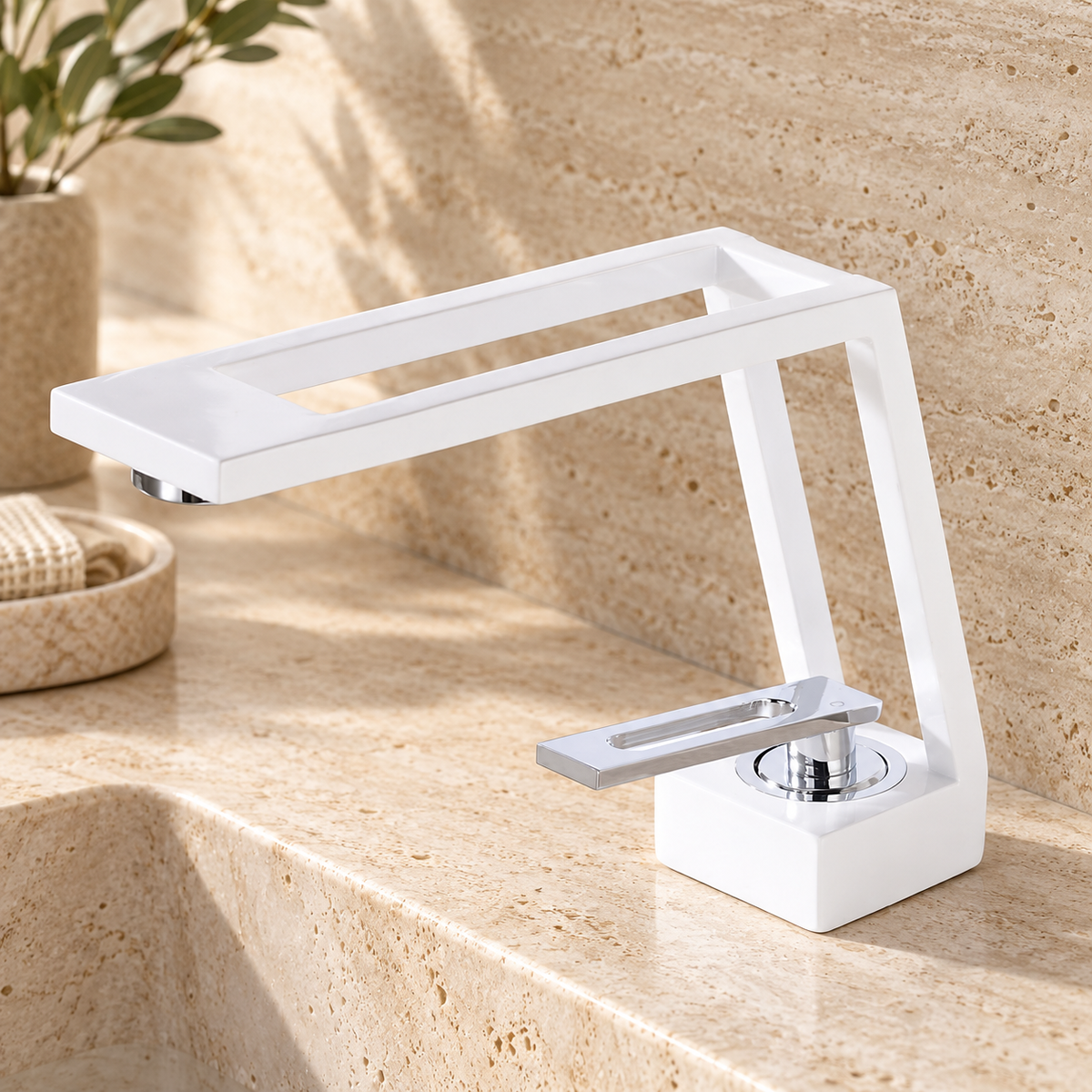White cut-out basin tap on a pale travertine vanity