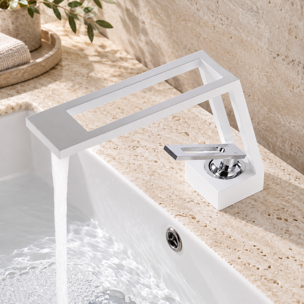 White cut-out basin tap running water into a white ceramic basin