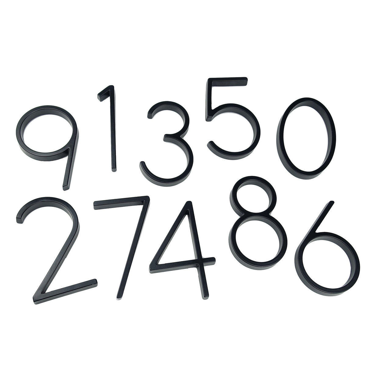 Black zinc alloy house number set from 0 through 9 on a white background