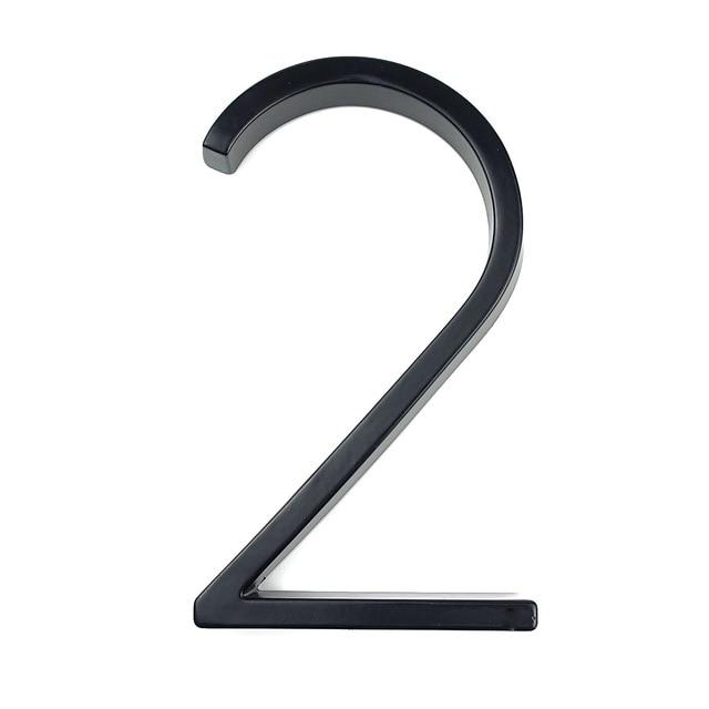 Black zinc alloy house number 2 isolated on a white background