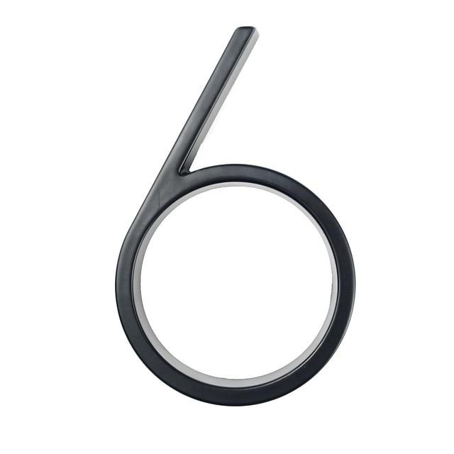Black zinc alloy house number 6 isolated on a white background