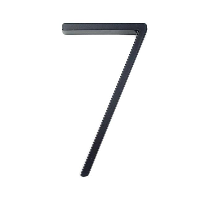 Black zinc alloy house number 7 isolated on a white background
