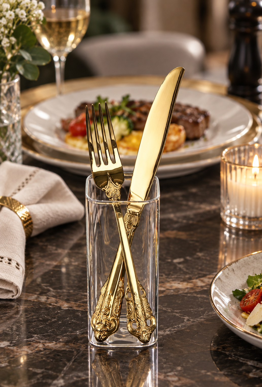 Solva gold and silver vintage cutlery displayed in a glass