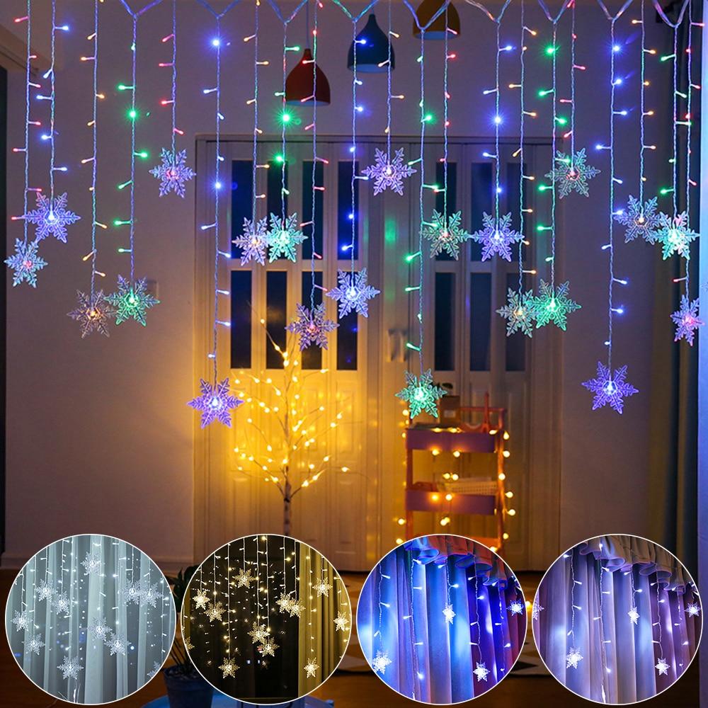 Torun snowflake LED string lights colorful display with cold, warm, blue and purple glow samples