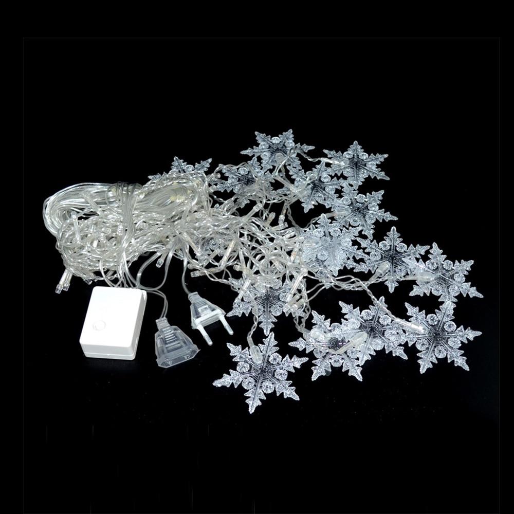 Torun snowflake LED string lights unlit with clear cable, connector and white controller