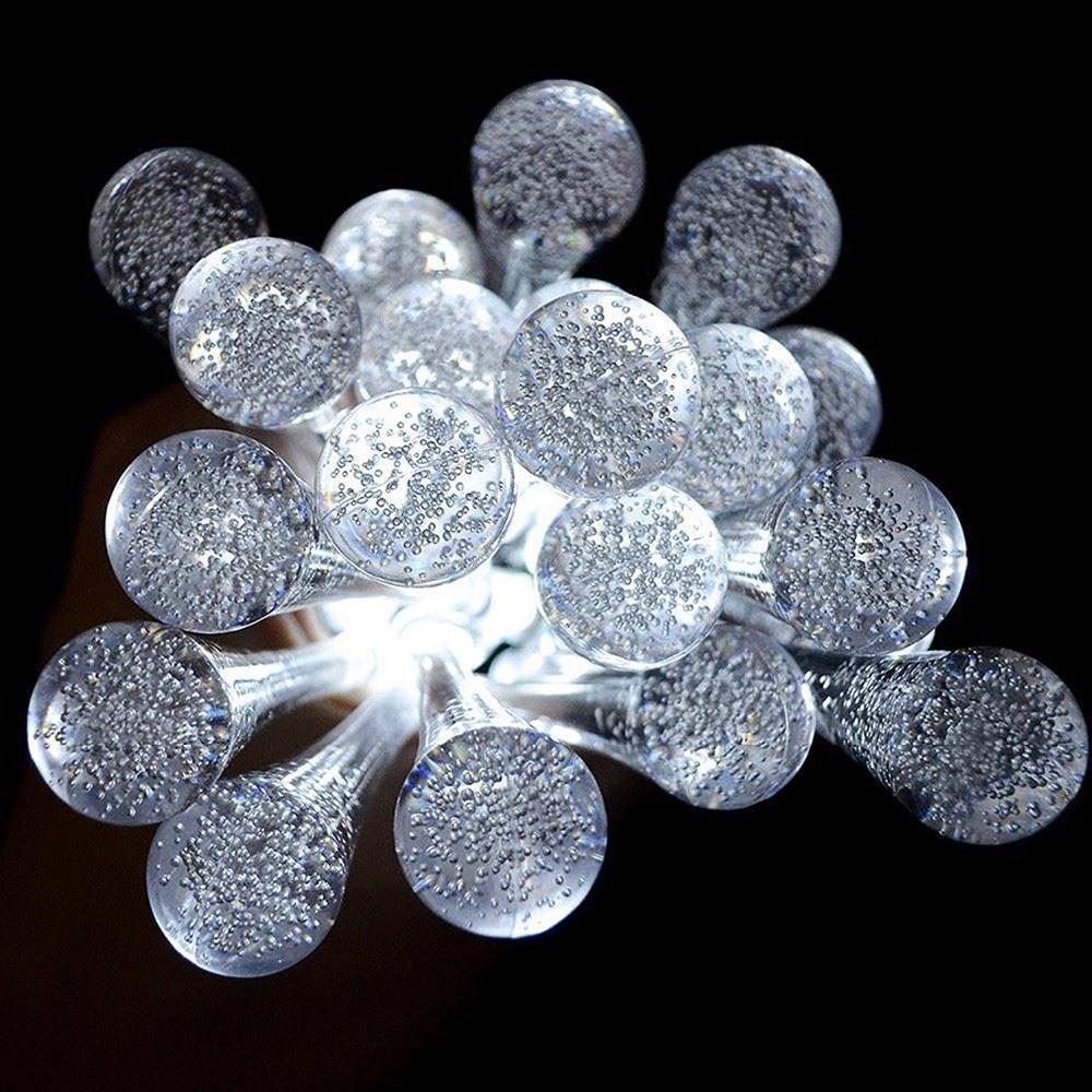 Sigrid white solar droplet string lights close-up showing bubble-filled bulbs