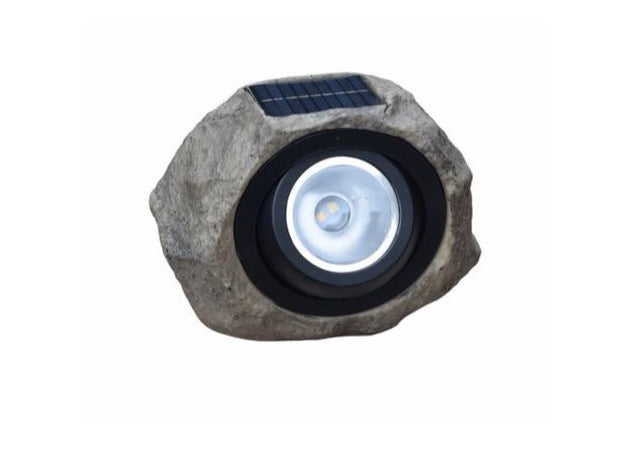 Stone-effect solar garden light front view with solar panel on white