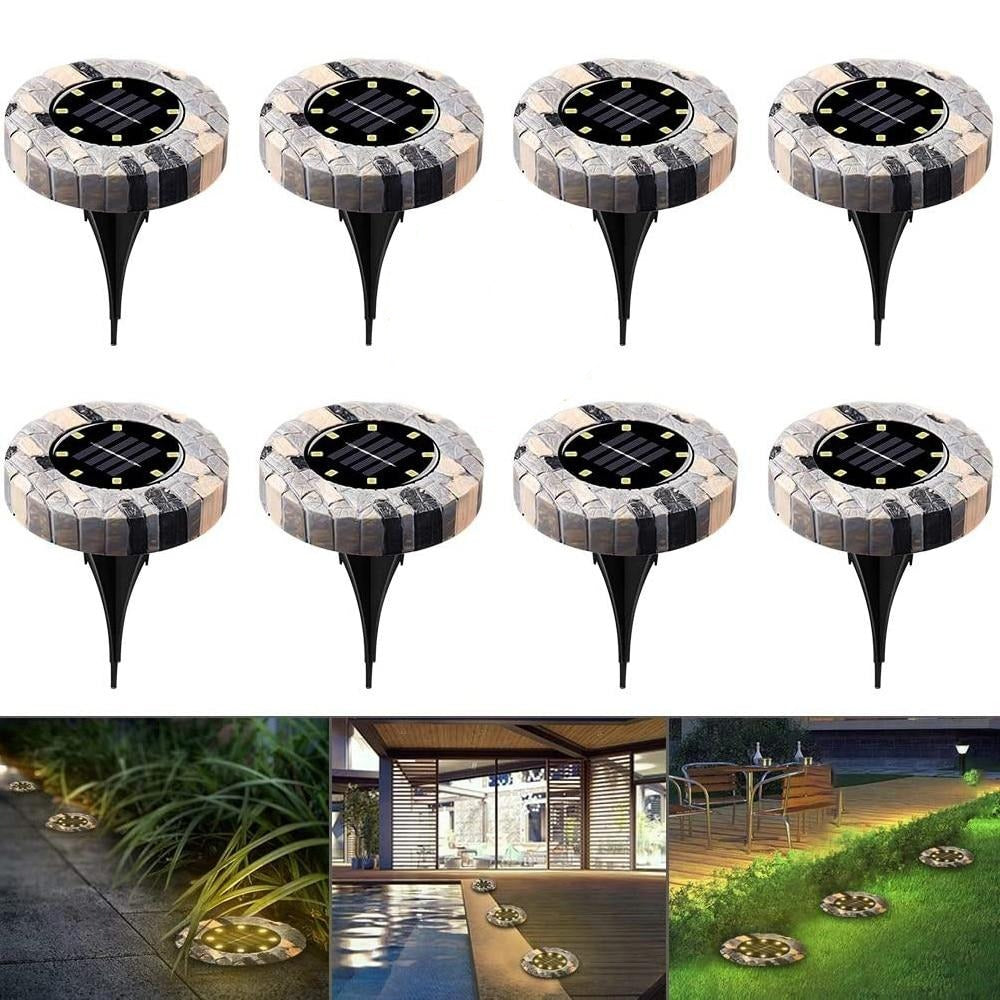 Eight stone solar pathway lights with placement examples for paths, patios and garden borders
