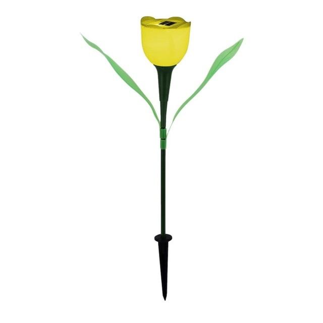 Yellow solar tulip garden stake light with green leaves and black soil stake