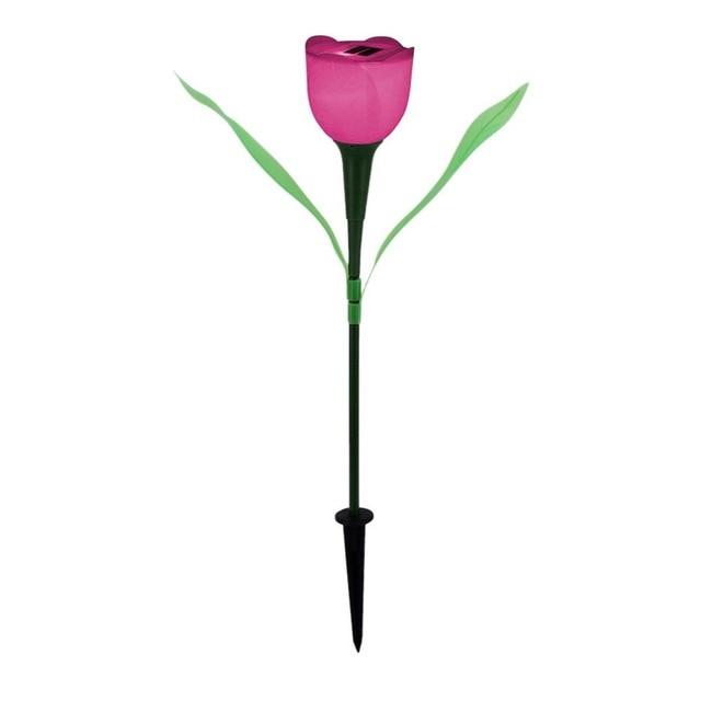Pink solar tulip garden stake light with green leaves and black soil stake